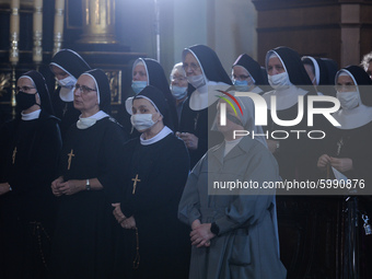 A group of nuns seen praying ahead of  Cardinal Marian Jaworski's funeral mass inside the Bernardine monastery in Kalwaria Zebrzydowska.
On...