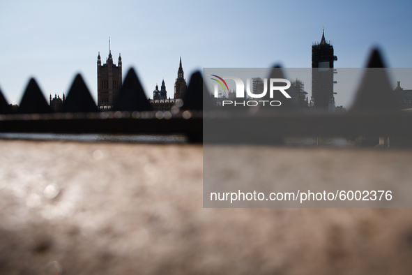 The Houses of Parliament stand on the north side of the River Thames in London, England, on September 14, 2020. 