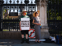 Anti-Brexit activists demonstrate outside the Houses of Parliament in Parliament Square in London, England, on September 14, 2020. (