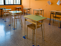 Detail of the desks of a school classroom with spacing and horizontal signs in the Don Tonino Bello High School in Molfetta on 16th Septembe...