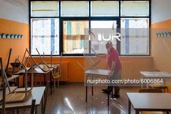A janitor preparing the classroom with the spacing of the desks in the Don Tonino Bello High School in Molfetta on 16th September 2020.
The...