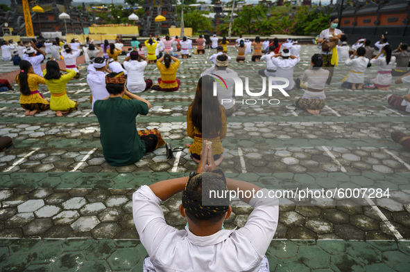 Hindus attend Galungan Day prayers at Pura Agung Wana Kerta Jagatnatha, Palu City, Central Sulawesi Province, Indonesia on September 16, 202...
