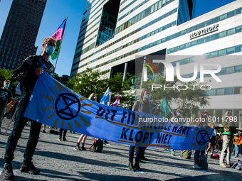 Preview to the blockade, climate activists gathered at the Gustav Mahlerplein during a legal demonstration at the Zuidas, the financial hear...