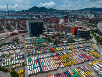 In this photo taken on September 7, 2020 shows an Aerial Photograph of a parked tour buses parked in a parking lot in Hong Kong, China.  (