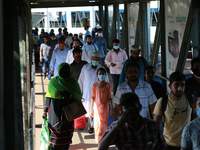People arrived at the Sadarghat ferry terminal in Dhaka from the southern part of Bangladesh on September 19, 2020. (