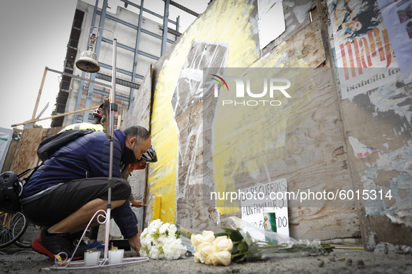 People pay homage outside where the Alvaro Obregon 286 building was located on September 19, 2020, in Mexico City, Mexico.
Rescuers, relativ...