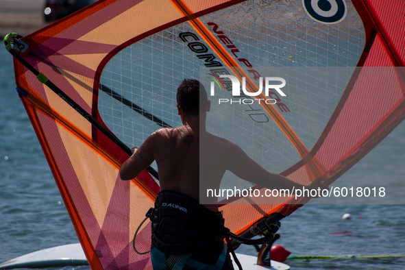 A windsurfer preparing to ride the wind. In Athens, Greece, on September 20, 2020. 