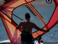 A windsurfer preparing to ride the wind. In Athens, Greece, on September 20, 2020. (
