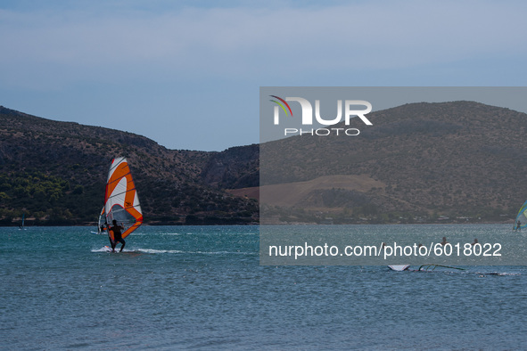 Warm and windy Septembers are perfect for windsurfing. In Athens, Greece, on September 20, 2020. 