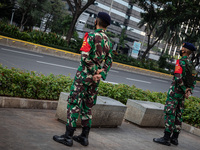 Millitary personnel while guarding street sudirman during partial lock down on 24 September 2020. . Jakarta's return to stricter social-dist...
