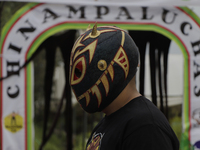 Dagma, a member of Chinampaluchas, prior to a wrestling function in chinampas of Lake Xochimilco during the health emergency due to COVID-19...
