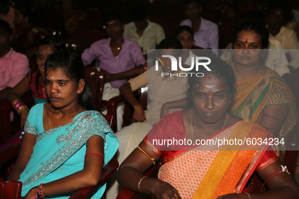 People watch as Tamil children who were orphaned during the civil war take part in a special cultural program in Jaffna, Sri Lanka, on Augus...