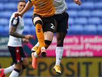   Newports Ryan Taylor clashes with Boltons Liam Gordon during the Sky Bet League 2 match between Bolton Wanderers and Newport County at the...