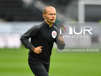 
Assistant referee, Rob Smith warms up ahead of kick-off during the Sky Bet Championship match between Derby County and Blackburn Rovers a...