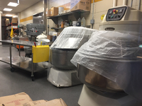 Industrial mixers and other equipment in a large bakery in Toronto, Ontario, Canada.  (