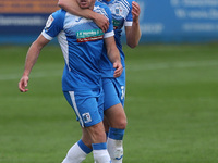  Barrow's Mike Jones celebrates with Tom Beadling after  scoring the equalising goal during the Sky Bet League 2 match between Barrow and Co...