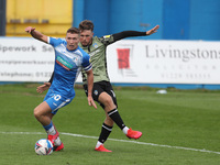      Noah Chilvers of Colchester United battles for possession with Lewis Hardcastle of Barrow during the Sky Bet League 2 match between Bar...