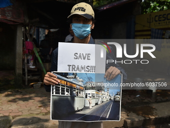 Calcutta Tram Users Association, school and college students organized a silent protest for preservation of only pollution free vehicle, old...