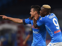 Hirving Lozano and Victor Osimhen of SSC Napoli celebrates after scoring during the Serie A match between SSC Napoli and Genoa CFC at Stadio...