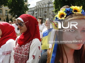 Ukrainians dressed in vyshyvankas with traditional embroideries attend the 'March in vyshyvankas' in downtown Kiev, Ukraine, 24 May 2015. Vy...