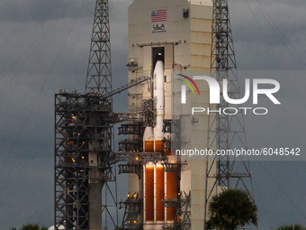 ULA's Delta IV Heavy Rocket with a classified payload for the NRO's Mission NROL44 emerges from the MST (Mobile Service Tower) hours before...