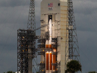 ULA's Delta IV Heavy Rocket with a classified payload for the NRO's Mission NROL44 emerges from the MST (Mobile Service Tower) hours before...