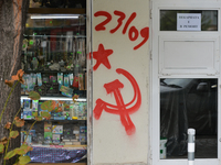 A shop facade vandalised with a graffiti (the union of the hammer and the sickle), seen in Sofia city center. 
On October 1st, 2020, in Sofi...