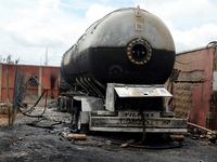 Burnt gas tank at Baruwa, Lagos on Thursday. Gas explosion from Best Roof Cooking Gas Station killed 8 people including an infant, destroyed...