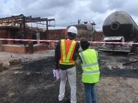 Lagos State Government officials assess the affected property at the scene of gas explosion in Bauwa, Lagos on Thursday. Gas explosion from...