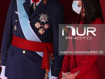 King Felipe VI of Spain, Queen Letizia of Spain  attend the National Day Military Parade at the Royal Palace on October 12, 2020 in Madrid,...