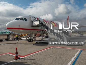The plane parked at the destination airport. Flying with Lauda Airbus A320 airplane with registration 9H-LMJ during the Covid-19 Coronavirus...