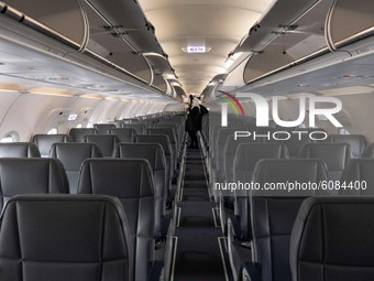 The interior of te cabin after landing with empty seats. Flying with Lauda Airbus A320 airplane with registration 9H-LMJ during the Covid-19...