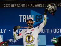 Pau Martinez, Vertigo Team (gold medal) celebrate on the podium during the FIM Trial125 World Championships Lazzate, Italy, on October 11, 2...