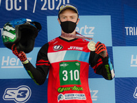 Ben Dignan, Vertigo Team (bronze medal) celebrate on the podium during the FIM Trial125 World Championships Lazzate, Italy, on October 11, 2...