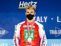 Leo Guiraud, Beta Team (silver medal) celebrate on the podium during the FIM Trial125 World Championships Lazzate, Italy, on October 11, 202...