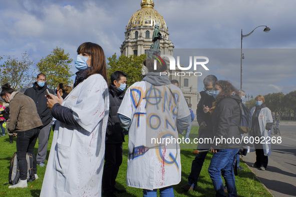 Healthcare workers take part in a demonstration near the Ministry of Solidarity and Health in Paris, France, on October 14, 2020. They deman...