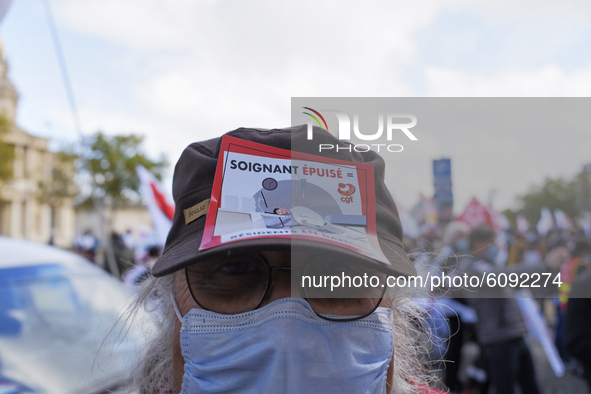 Healthcare workers take part in a demonstration near the Ministry of Solidarity and Health in Paris, France, on October 14, 2020. They deman...