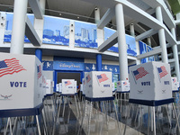Voting booths are seen at an early voting site established by the City of Orlando and the Orlando Magic in the Disney Atrium at the Amway Ce...
