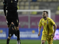 Stefan Ilsanker of Austria in action against Alexandru Maxim of Romaniania during match against Romania of UEFA Nations League football matc...
