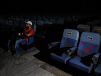 Social distancing marks inside a movie theater in Kolkata, India, on October 16, 2020. Cinema halls are permitted to open with 50 % audience...