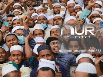 Muslims take part in a protest demanding women's safety and justice for rape victims amid the COVID-19 coronavirus outbreak in Dhaka, Bangla...