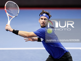 Cameron Norrie of United States returns the ball to Andrey Rublev of Russia during their ATP St. Petersburg Open 2020 international tennis t...