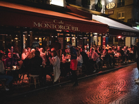 In the Parisian district of Les Halles at the level of rue Montorgueil, the brasseries and restaurants are full as the curfew introduced to...