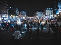 In the Parisian district of the Opéra Garnier the streets are full of people while the curfew introduced to deal with the outbreak of the co...
