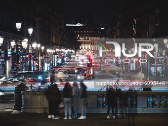 In the Parisian district of the Opéra Garnier the streets are full of people while the curfew introduced to deal with the outbreak of the co...