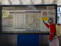 A city hall worker sprays disinfectant at a train station in Kuala Lumpur, Malaysia, on  October 17, 2020. 
Malaysias capital state Kuala Lu...