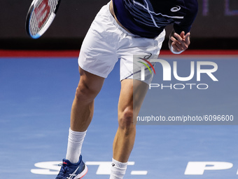 Borna Coric of Croatia serves the ball during his ATP St. Petersburg Open 2020 international tennis tournament semi-final match against Milo...