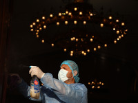 A Palestinian worker sanitizes a mosque amid the coronavirus disease (COVID-19) outbreak in Gaza City October 17, 2020. 
 (