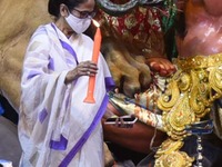 West Bengal Chief Minister Mamata Banerjee  inaugurates temporary platform  of  a community  Durga Puja pandal  is decorated in Kolkata, Ind...