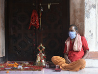 A priest at the Hindu temple Kamakhya during the first day of Navratri Festival, in Guwahati, India on 17 October 2020. Kamakhya Temple was...